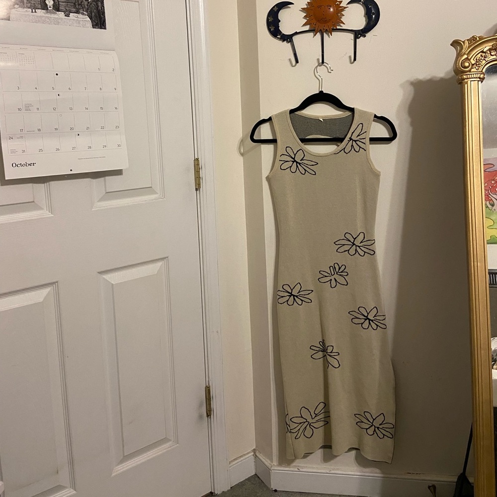 Floral maxi dress with open back and slit!